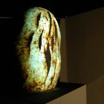Video projection on clay, 24"x13", 7 min. 2006.